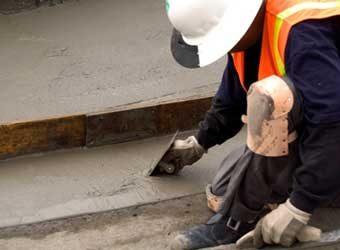 a contractor applying concrete