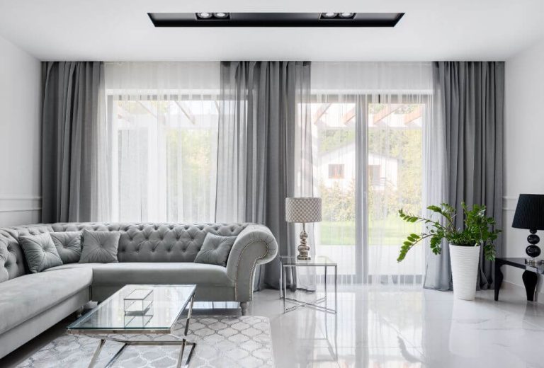 gray theme living room area on epoxy flooring