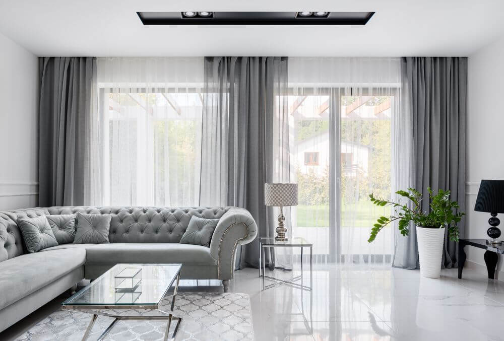 gray theme living room area on epoxy flooring
