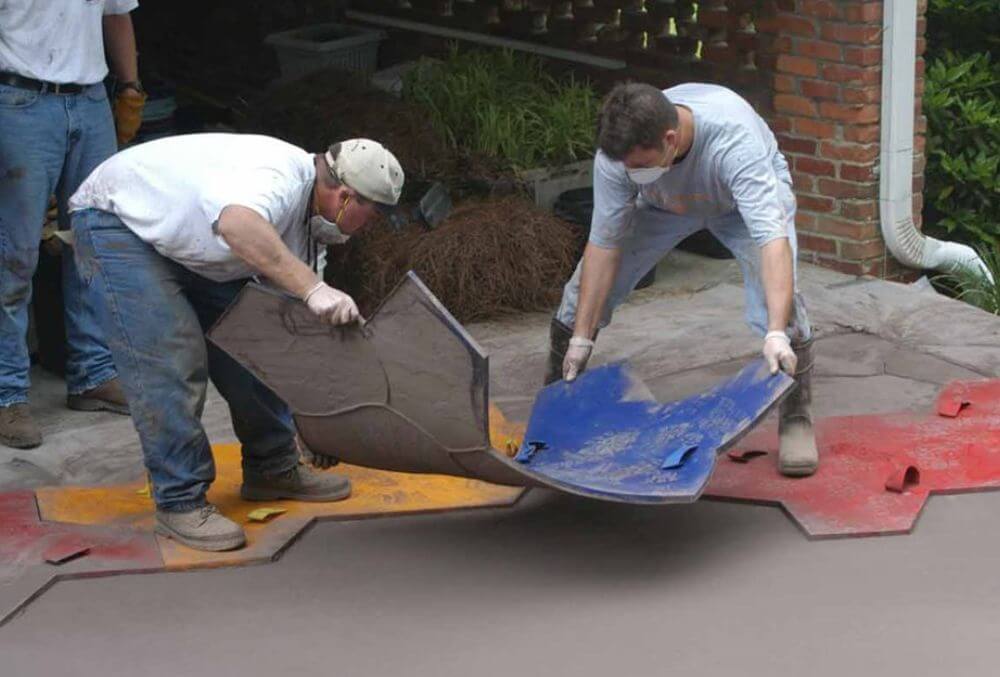 contractors working on in the garage floor