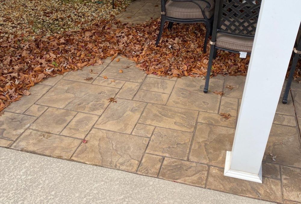 Stamped concrete patio with textured stone pattern