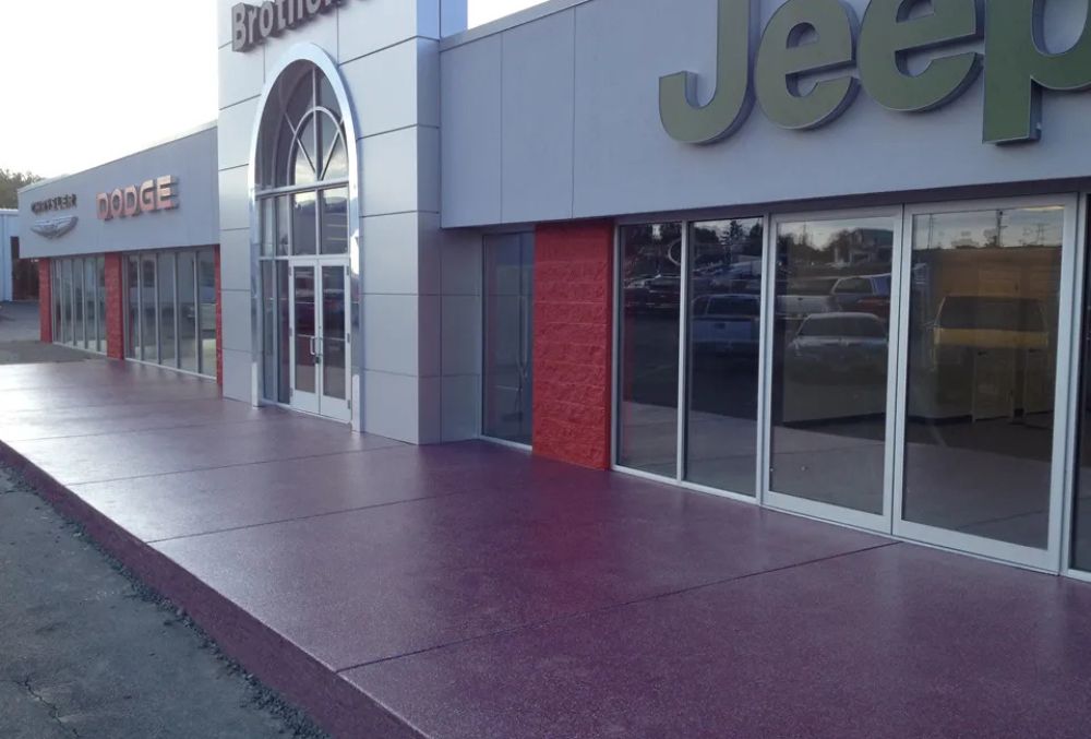 Decorative concrete storefront with glass windows