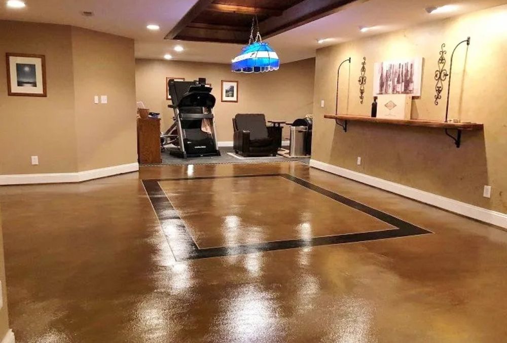 Polished concrete interior floor with decorative border