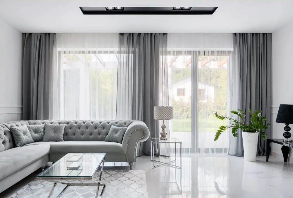 gray theme living room area on epoxy flooring