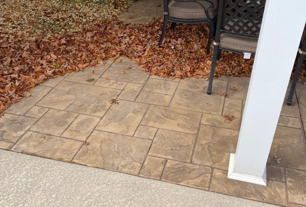 Stamped concrete patio with textured stone pattern