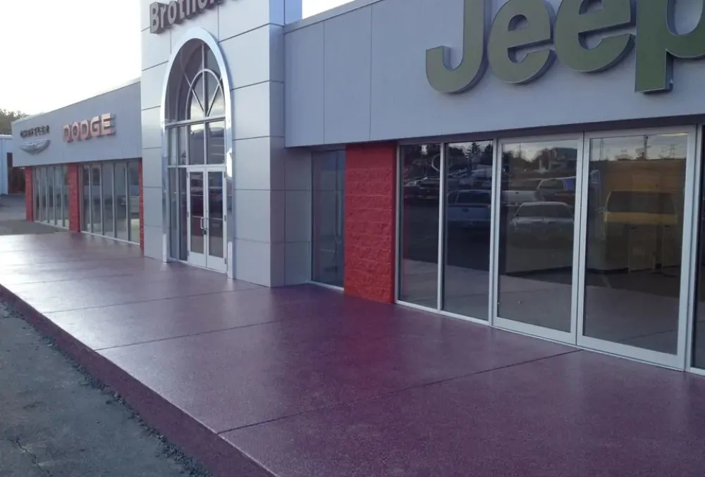 Decorative concrete storefront with glass windows